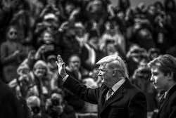 President Donald J. Trump waves at spectators during the 58th presidential inauguration parade in Washington, D.C., Jan. 20, 2017. 