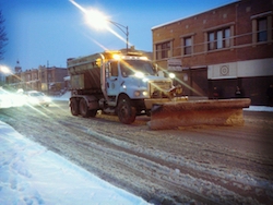 Chicago Public Works snow plow truck with a roll off salt spreader.